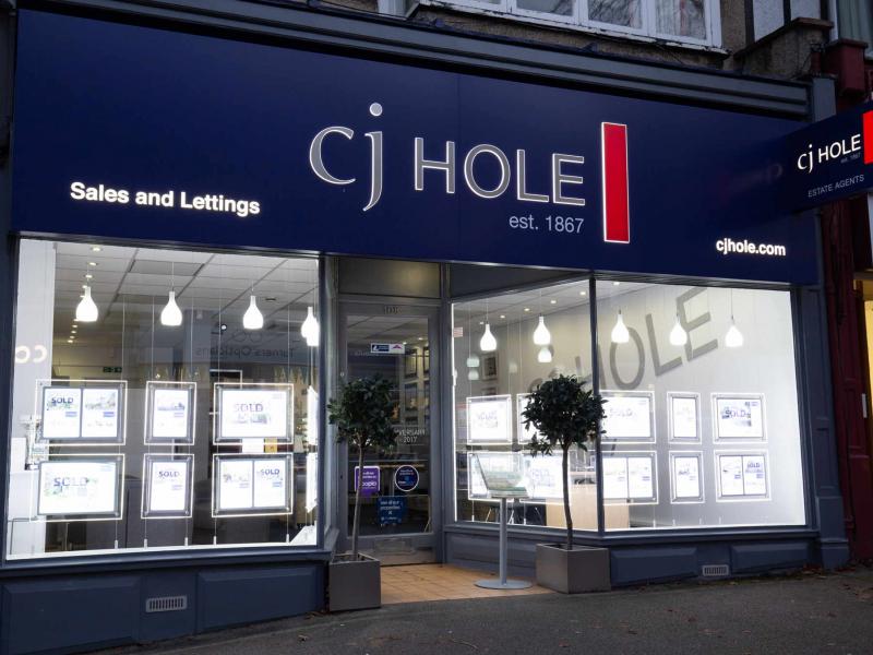 Exterior view of CJ Hole Henleaze estate agent office.