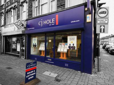 Exterior view of CJ Hole Kingswood estate agent office.