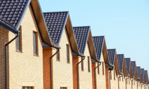 row of houses with solar panels