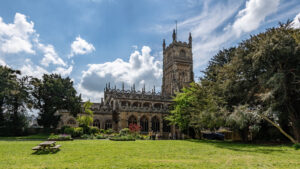 Large church featuring an impressive clock tower.