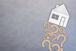 House exterior featuring question marks painted on the wall.