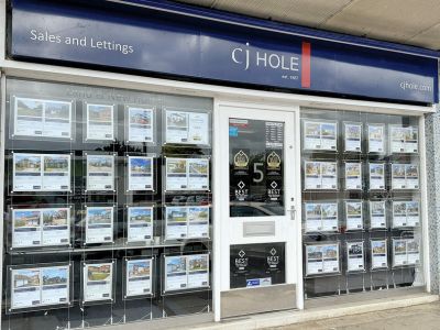 Exterior view of CJ Hole Hucclecote estate agent office.