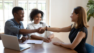 a group of people sitting around a table