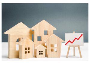 a house and a house with a red arrow pointing up