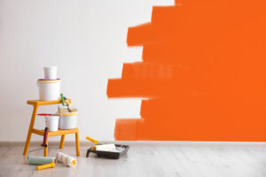 A room featuring vibrant orange walls, creating a warm atmosphere.