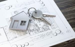 a house with keys on top of it