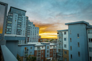 Sunset view from a balcony, with vibrant colours in the sky.