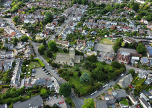 Aerial view of a quaint English town with charming architecture.