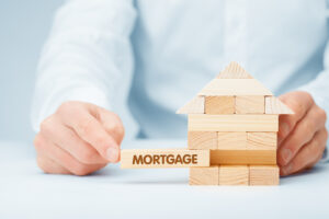 Mortgage and home loan concept with financial documents and calculator.