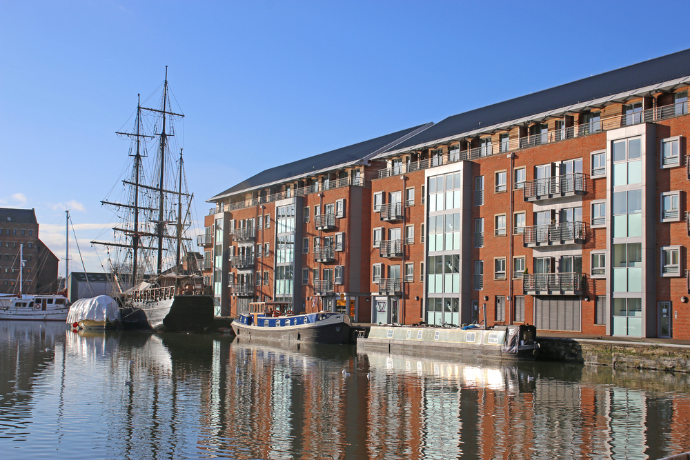 A vast expanse of tranquil water under a clear sky.
